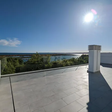 Ria Breez'in By Johnvillas